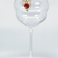 Verre à vin élégant Domaine Pilenium avec logo doré et rouge en verre transparent