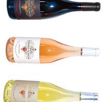 Trois bouteilles de vin bio AOP Corbières : rouge, rosé et blanc, produits en France dans un parc naturel protégé.